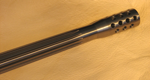 Fluted barrel with custom muzzle break